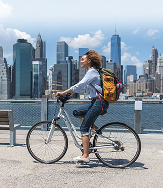 woman biking on domestic trip