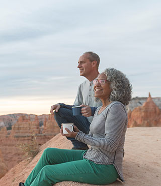 senior couple enjoying mountain view