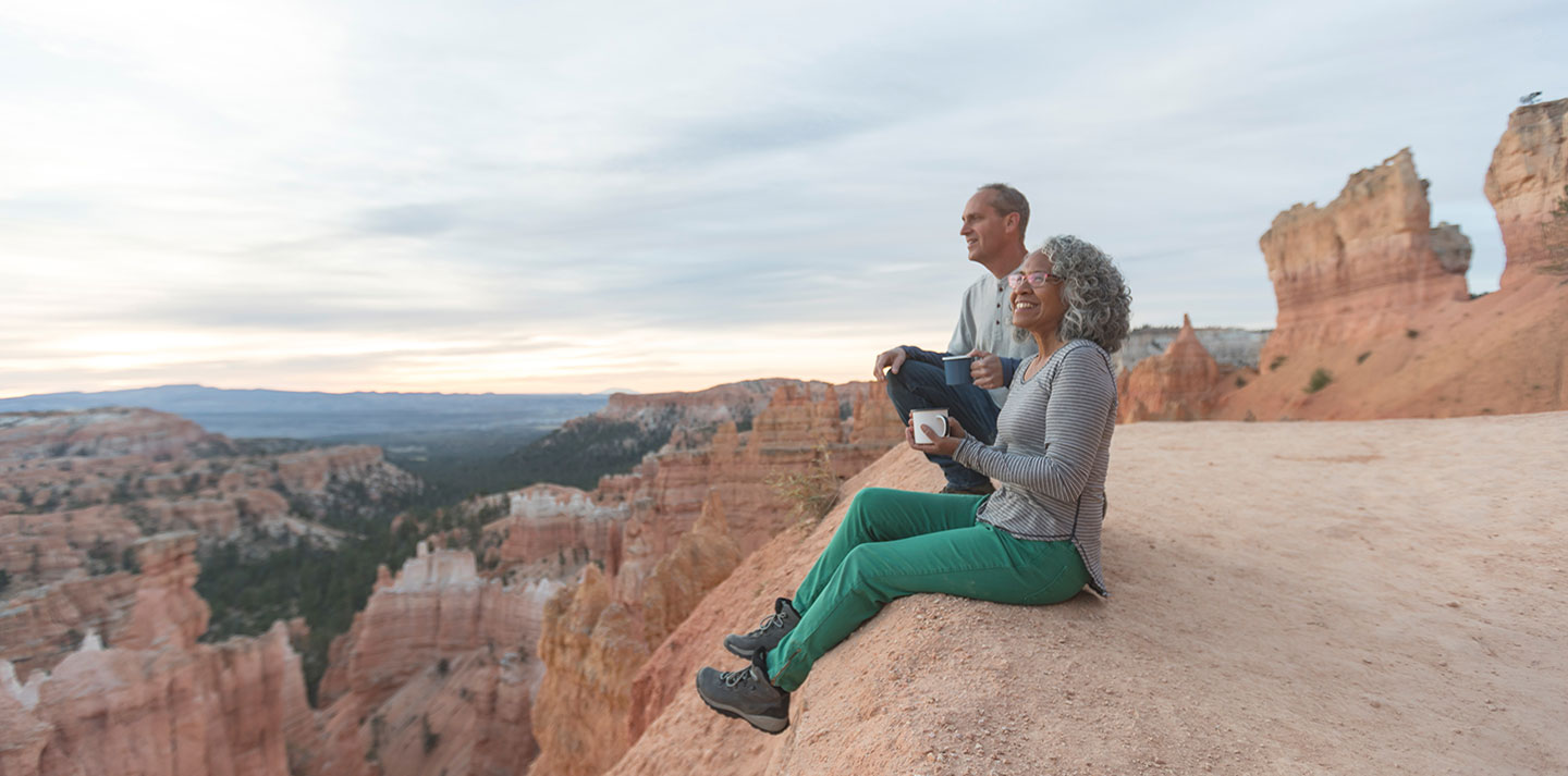 senior couple enjoying mountain view