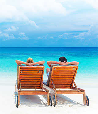 Couple relaxing on beach