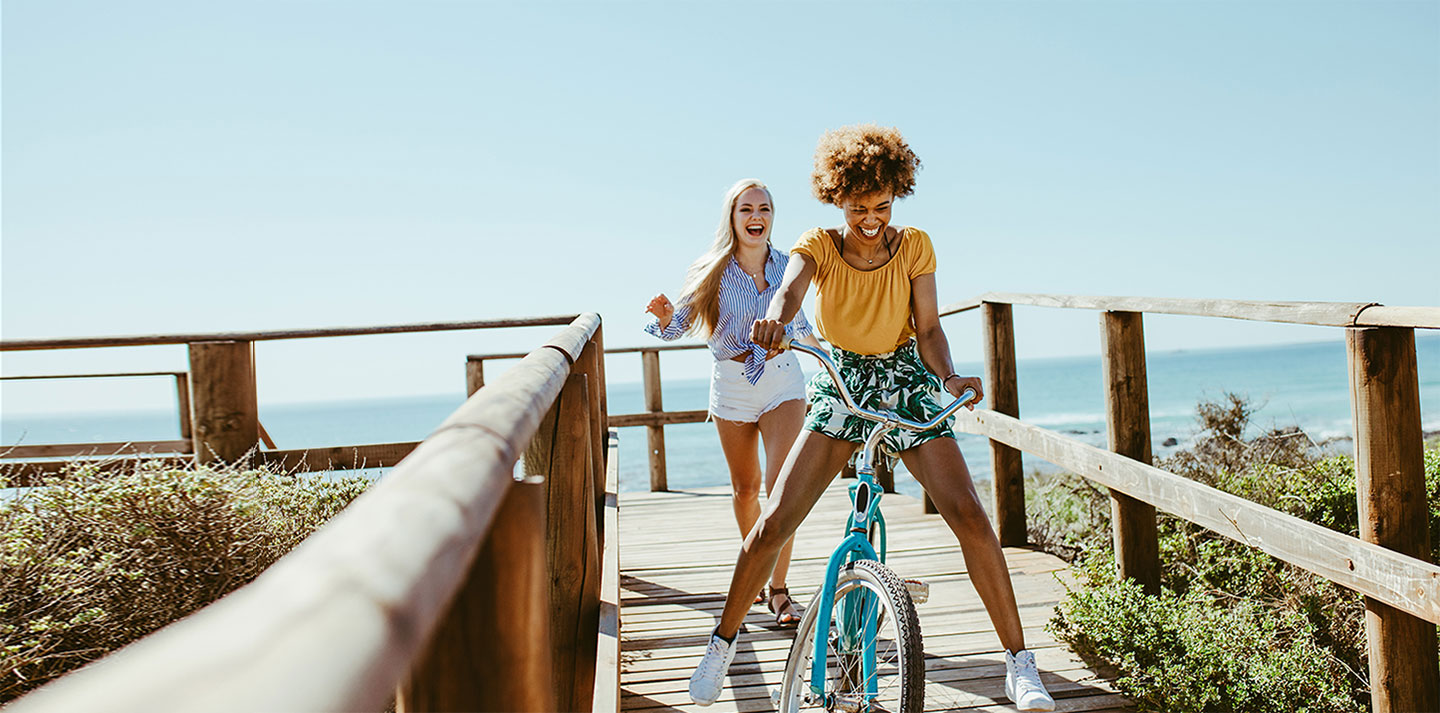 two girls on boardwalk