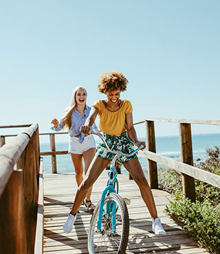 two girls on boardwalk