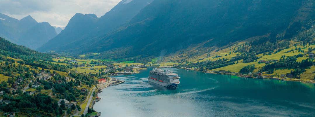 Use our cruise safety guide for trips like this one showing a cruise ship in Norway