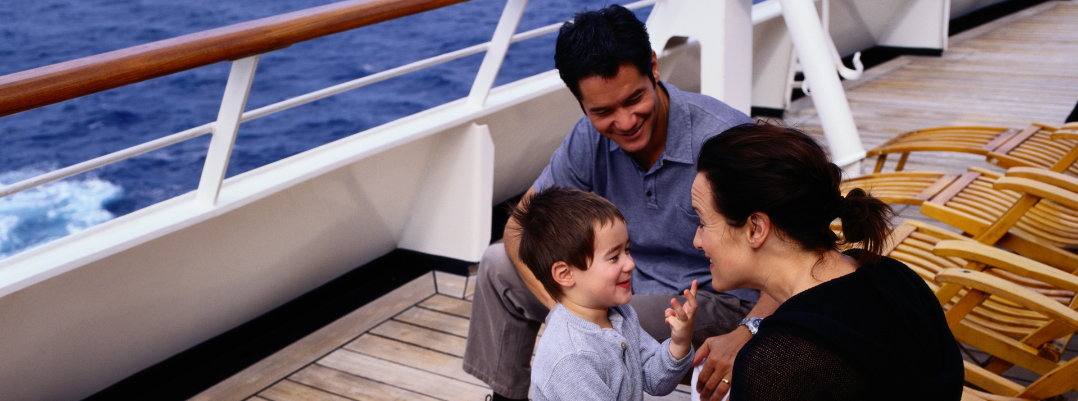 Our cruise safety guide has travel tips for families like this family of three on a cruise