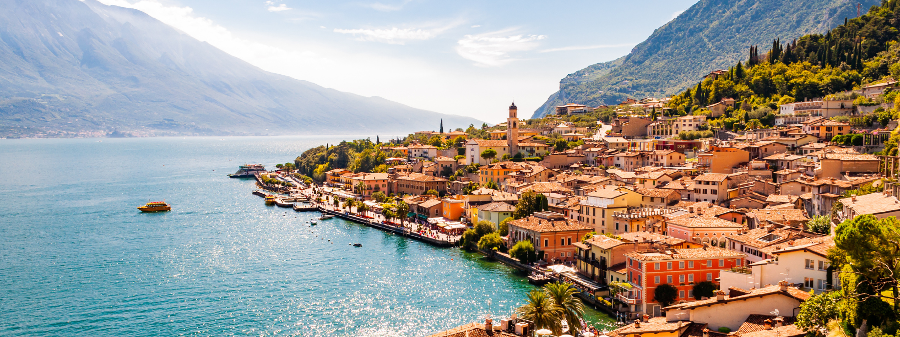 View of Limone Sul Garda city and Garda Lake, where you can travel with travel insurance for Italy