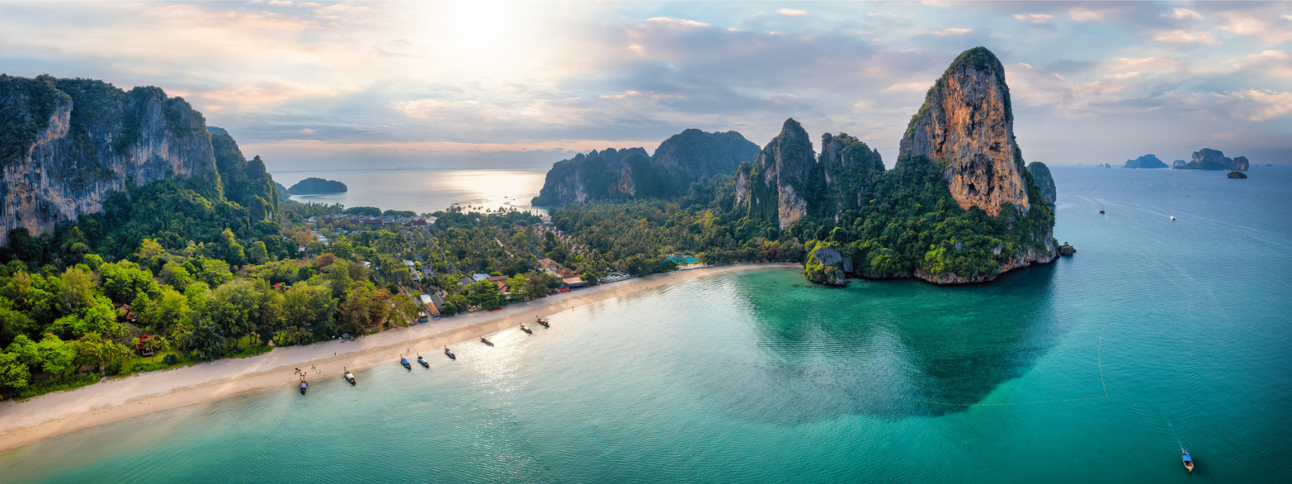 View of mountains and ocean at Railay Beach in Krabi, where you can explore with travel insurance for Thailand