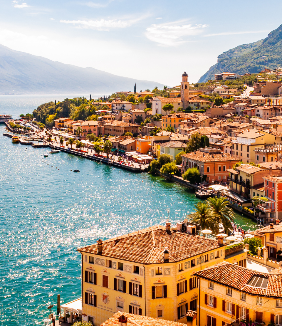 View of Limone Sul Garda city and Garda Lake, where you can travel with travel insurance for Italy