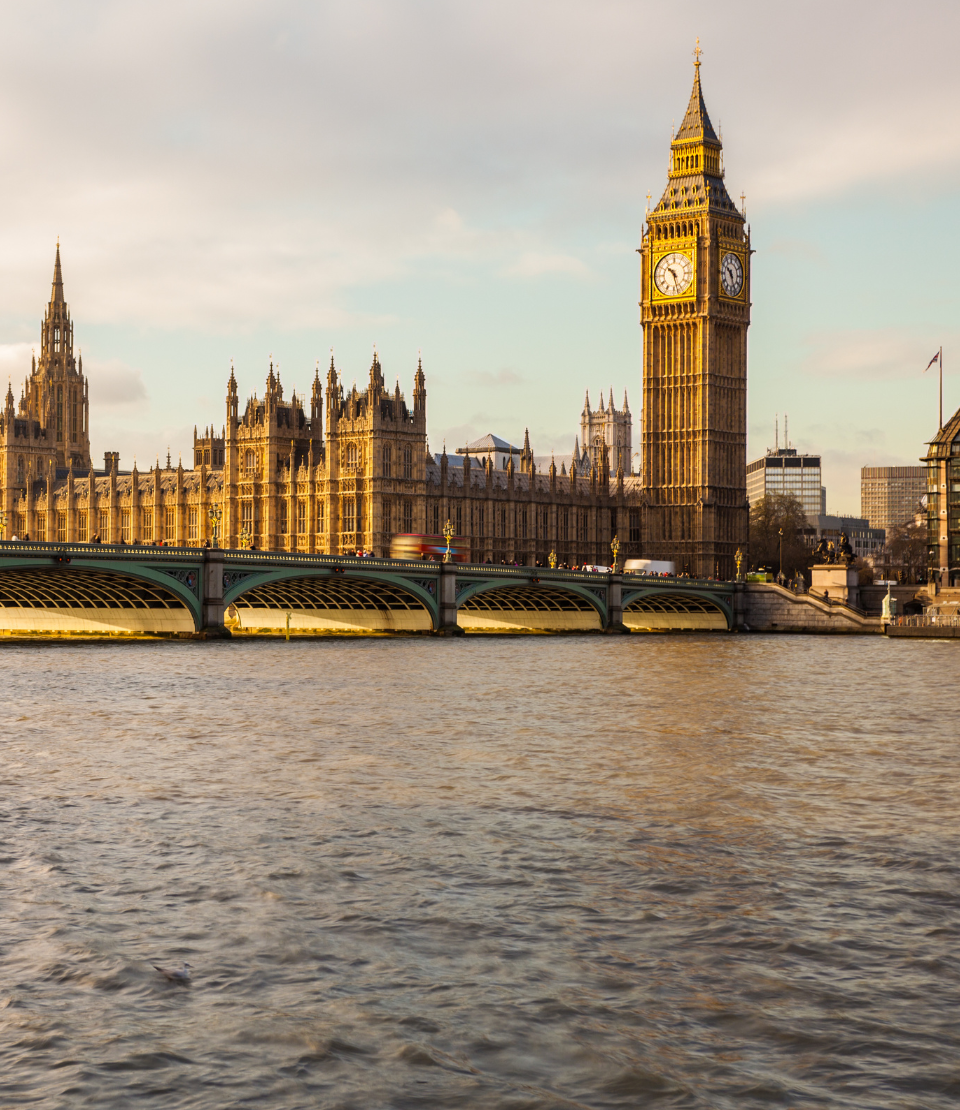 View of Westminster Bridge, River Thames, and Big Ben in London, where you can travel with travel insurance for the U.K.