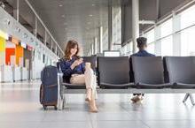 Woman waiting at airport gate