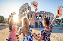 A group of friends in front of the Roman Colosseum