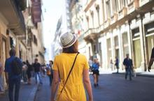 Tourist walking through town