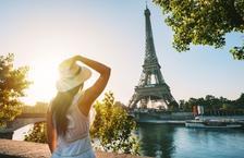 Woman gazing at Eiffel Tower