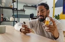 Man ordering prescription on phone